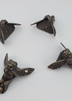 Комплект ніжок "ангелочки" (4 шт. із саморізами) для скриньки, металеві (колір — бронза) арт. 042333 фото