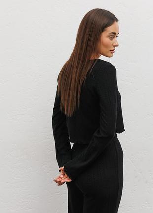 Трикотажна жіноча піжама з кофтою і штанами чорна