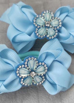 Резинки блакитні бантики з квіткою