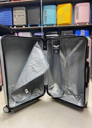 Чемодан wings рс 565 поликарбонат 100% устойчив к ударам и царапинам.10 фото