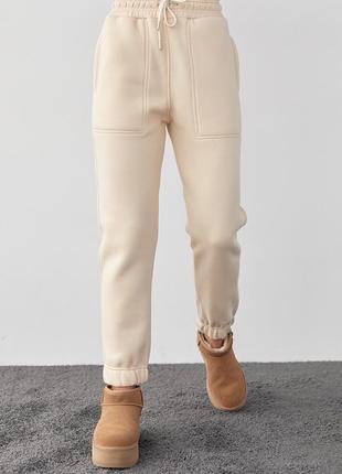 Жіночі теплі джогери ( спортивні штани) на флісі 3-нитка зимові бежевий колір  l
