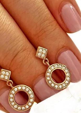 Позолочені сережки-гвоздики, позолота