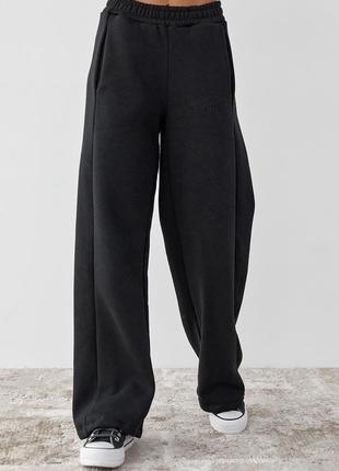 Трикотажні штани жіночі утеплені широкі 2-нитка чорний колір  m l