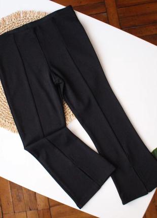 Стильные черные клешоны штанишки с разрезами tu 5 р