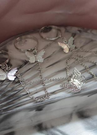 Набір кілець з ланцюгами та метеликами