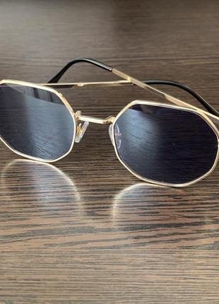 Окуляри, солнцезащитные очки