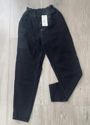 Джинсы на пуговицах багги