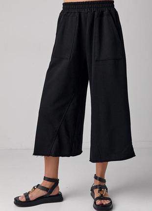 Трикотажные брюки-кюлоты с накладными карманами