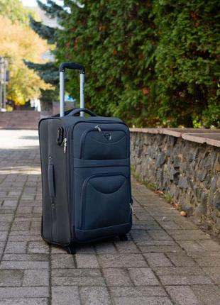 Тканина валіза с розмір на 4 колеса1 фото