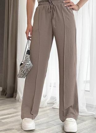 Легкие креповые женские брюки свободного кроя со стрелками стильные широкие брюки