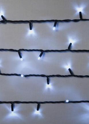 Гірлянда зовнішня delux string 200 led нитка 20m (2x10m) 40 flash білий/чорний ip44 en