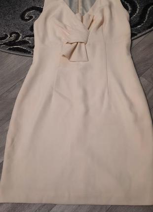 Елегантна сукня  молочного кольору з атласною підкладкою