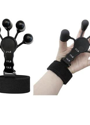 Еспандер для пальців рук чорний із трьома режимами. тренажер для розроблення пальців рук і розвитку пальців