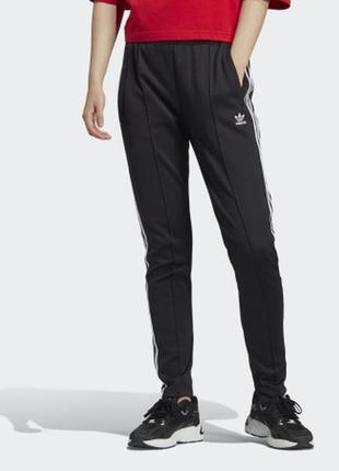 Нові чорні жіночі спортивні штани adidas adicolour sst розмір m-l