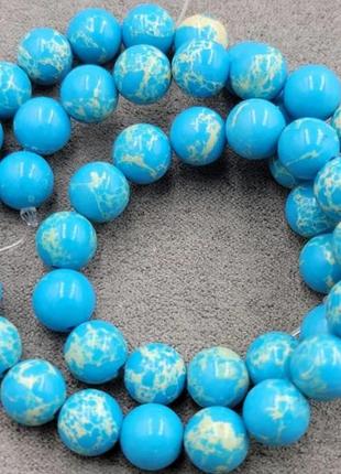Намистини на нитці натуральний камінь варісцит блакитна гладка кулька d=8мм
