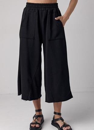 Хлопковые трикотажные брюки кюлоты с накладными карманами черные