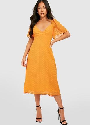 Жіночий модне літній оранжевий сарафан міді повітряна сукня boohoo