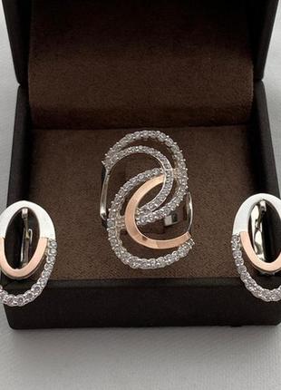 Серебряный комплект кольцо и серьги с фианитами и вставками золота
