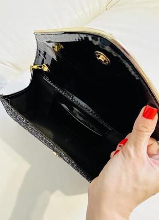 Черный блестящий клатч