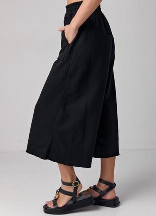 Женские качественные укороченные молодежные широкие брюки кюлоты черные плотные