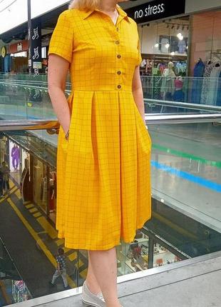 Жовте плаття-міді