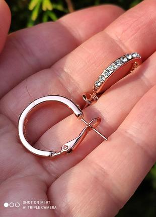 Сережки-кільця у позолоті.