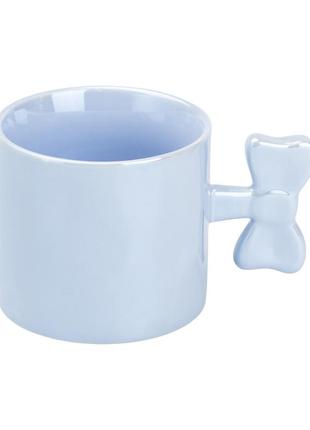 Чашка с ручкой в виде бантика керамическая 350 мл голубая