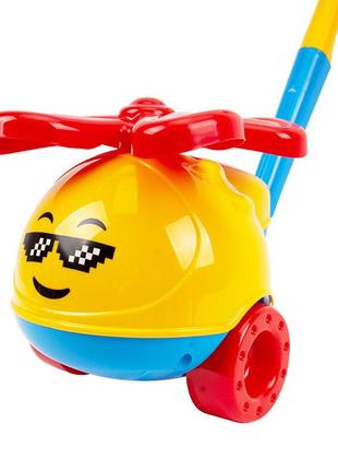 Дитяча іграшка-каталка вертоліт 9437txk у сітці (жовтий)