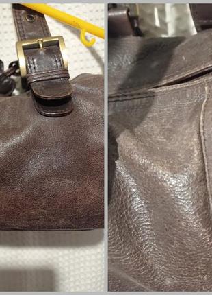 Стильна коричнева шкіряна містка сумочка з короткими ручками.6 фото