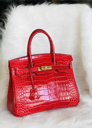 Женская кожаная лаковая красная сумка