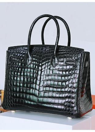 Женская кожаная черная лаковая сумка7 фото