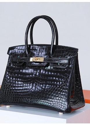 Женская кожаная черная лаковая сумка8 фото