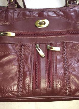 Нова шкіряна сумка бордово-коричневого кольору