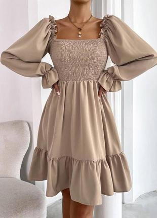 Жіноча сукня міді