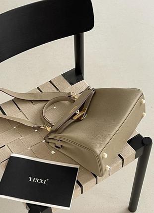 Женская кожаная бежевая сумка4 фото