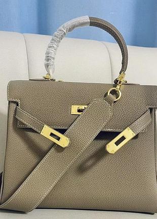 Женская кожаная бежевая сумка1 фото