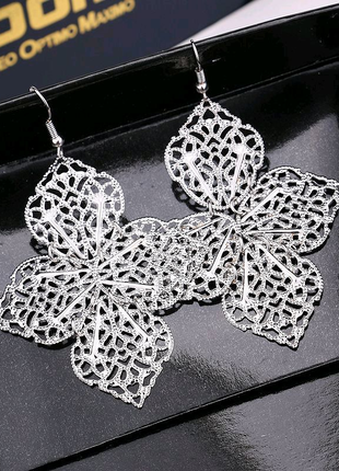 Сережки жіночі(в золоті, сріблі)