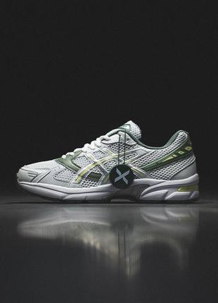 Кросівки чоловічі 
Reflective Japanese Katakana lettering and ASICS T-Shirt Spiral logo