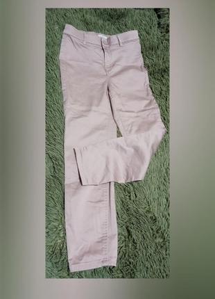 Женские брюки сиреневого цвета