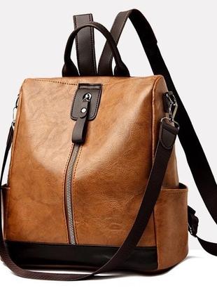 Чудовий рюкзак з великою кількістю кишень і можливістю використовувати як сумку
