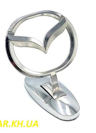 Mazda эмблема на ножке прицел на капот мазда