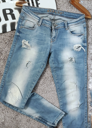 Модні рвані джинси1 фото