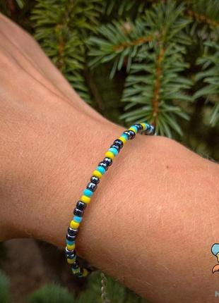 Браслет з бісеру жовто-блакитні вставки. сила