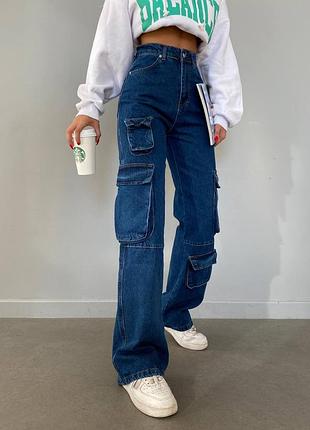 Джинси з накладними кишенями труби