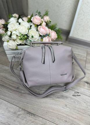 Жіноча сумка на кожен