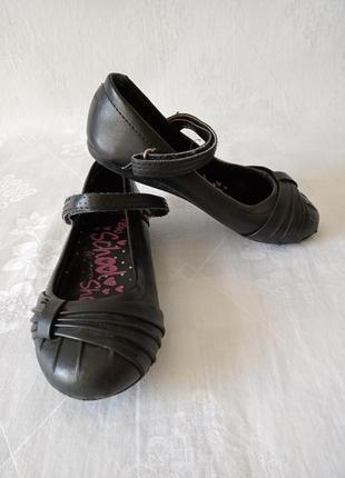 Чёрные туфли балетки