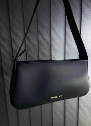 Чорна шкіряна жіноча сумка-багет bagllet b111
