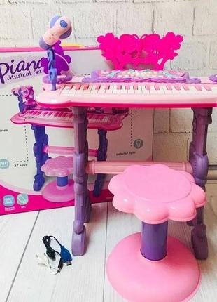 Детское пианино-синтезатор 6618 на ножках со стульчиком (розовое) от батареек и сети, mp3