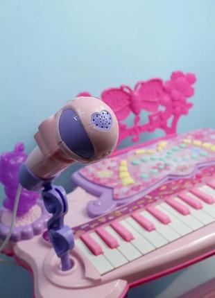 Детское пианино-синтезатор 6618 на ножках со стульчиком (розовое) от батареек и сети, mp33 фото