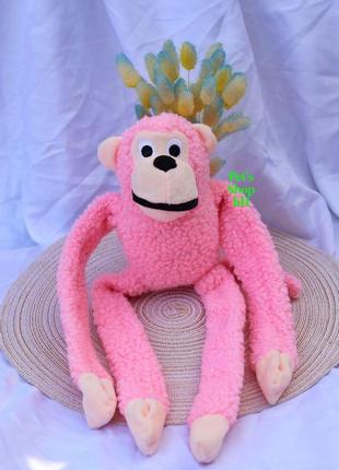 Игрушка для собак с пищалкой обезьяна розовая